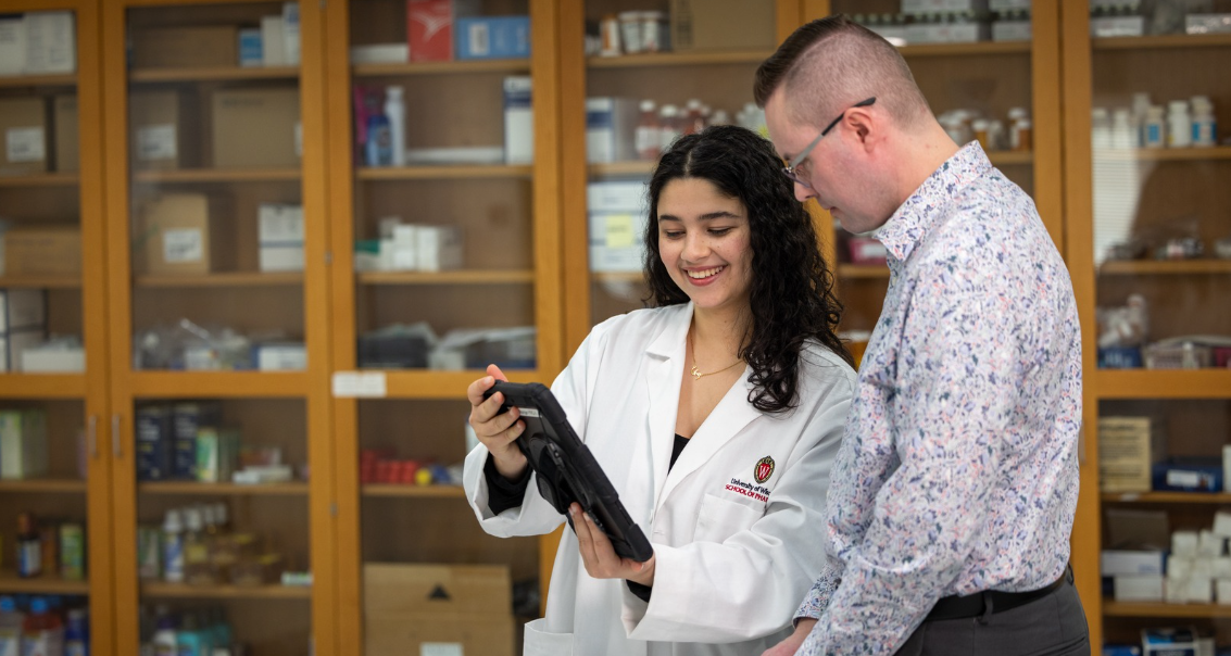 PharmD student with patient 