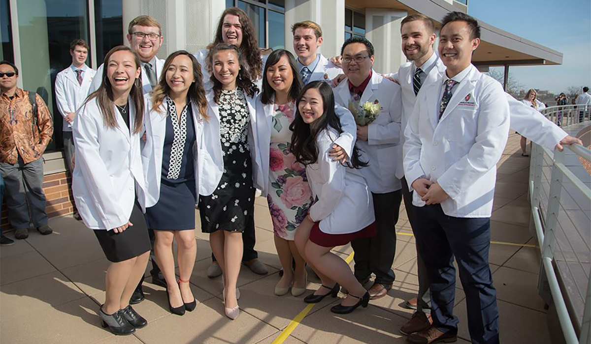 A-group-of-PharmD-students-gather-for-a-photo-after-the-White-Coat-Ceremon