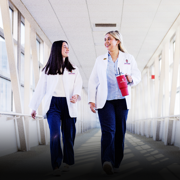 PharmD students walking through Rennebohm Hall